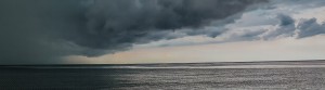Dark clouds hovering of the sea