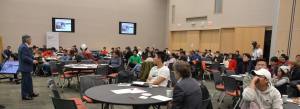 Blair Feltmate presenting to large group