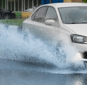 Car Driving through flood